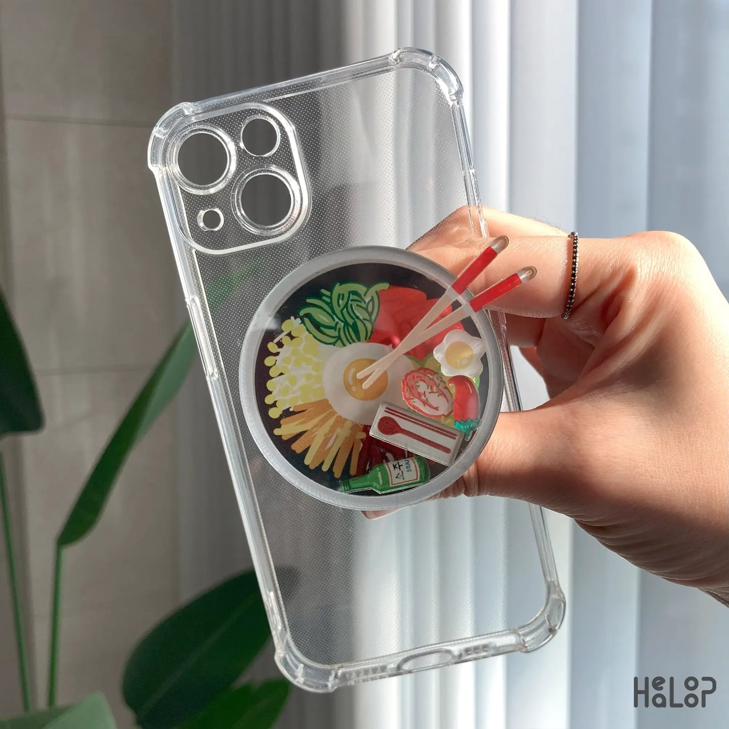 Korean bibimbap shaker phone grip mounted on clear case, durable acrylic GripTok