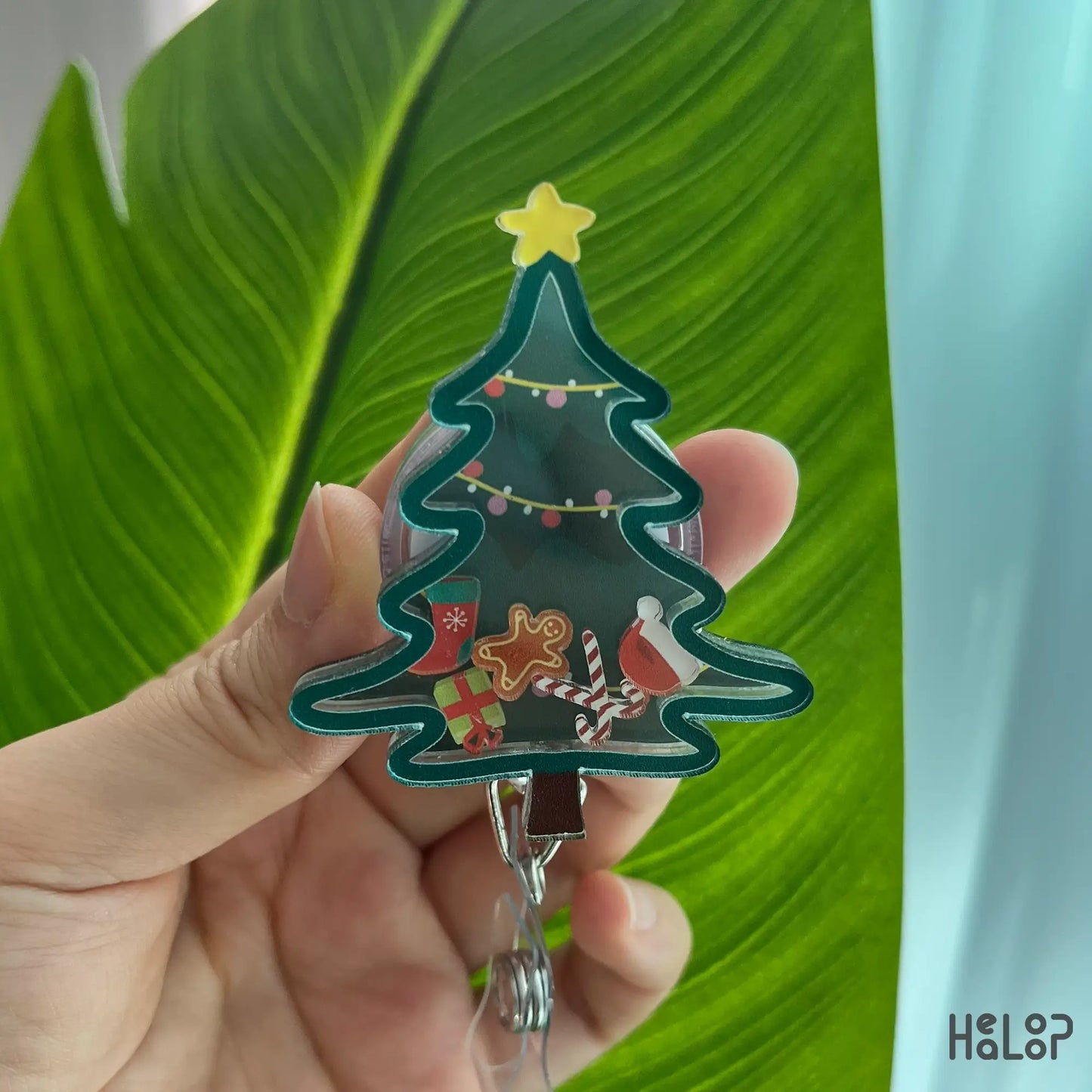 Holiday nurse ID holder shaped like a Christmas tree with acrylic shaker design
