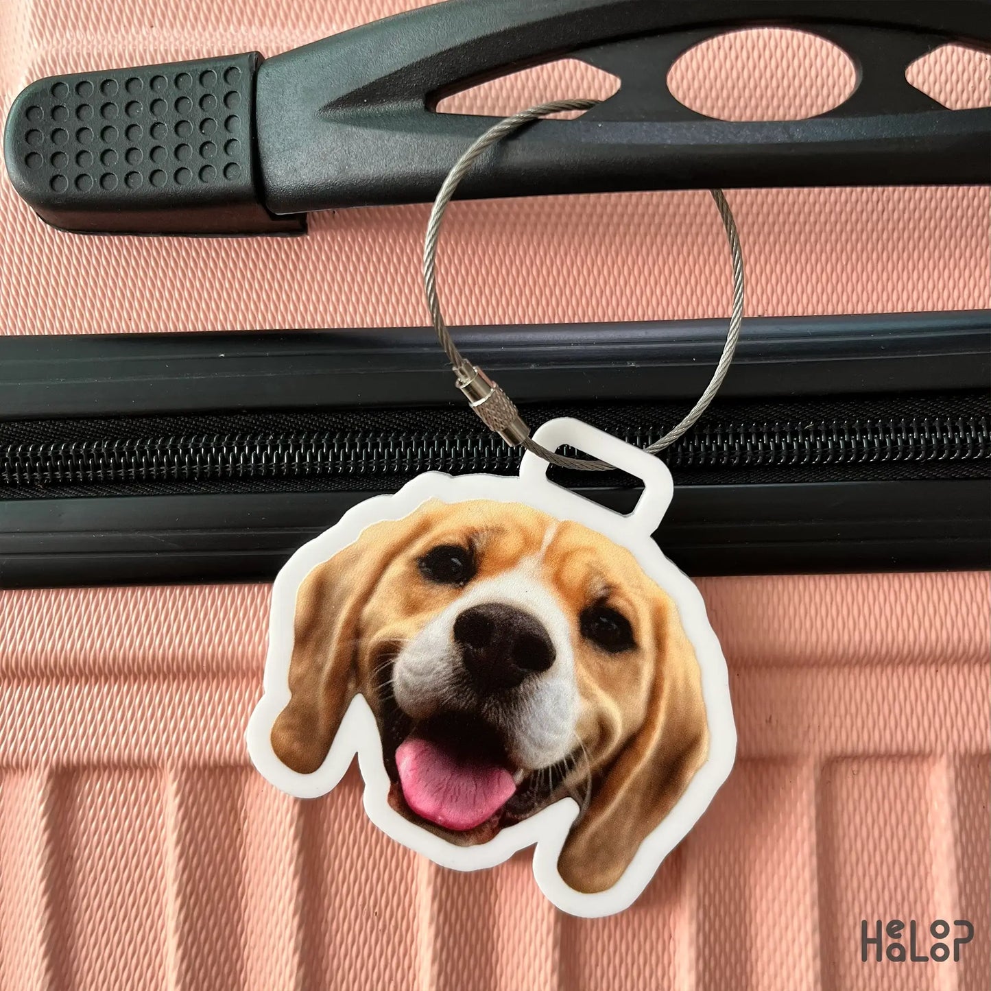 Custom dog luggage tag hanging on a travel suitcase zipper