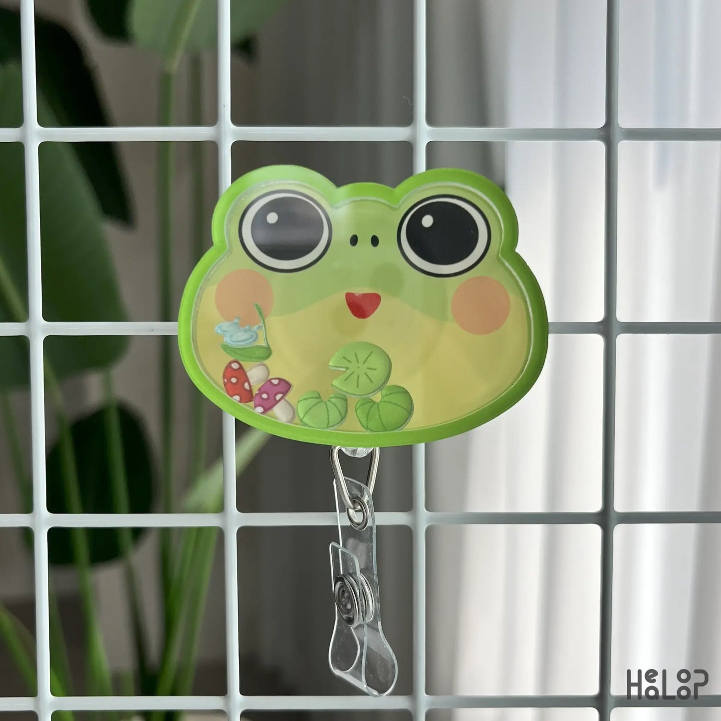 Frog badge reel on display grid, retractable ID holder