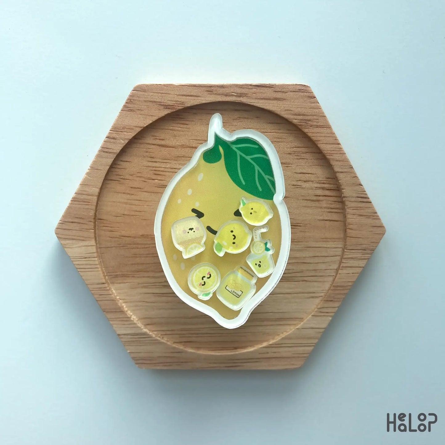 Front view of lemon shaker phone grip with acrylic lemon charms inside