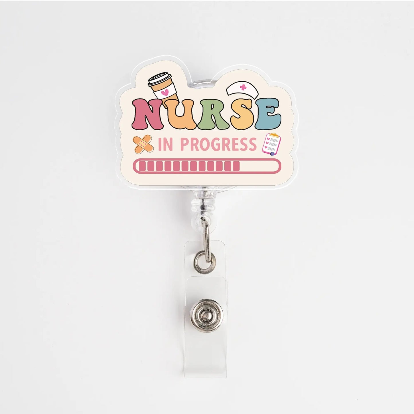 Badge holder with 'Nurse In Progress' design on a white background