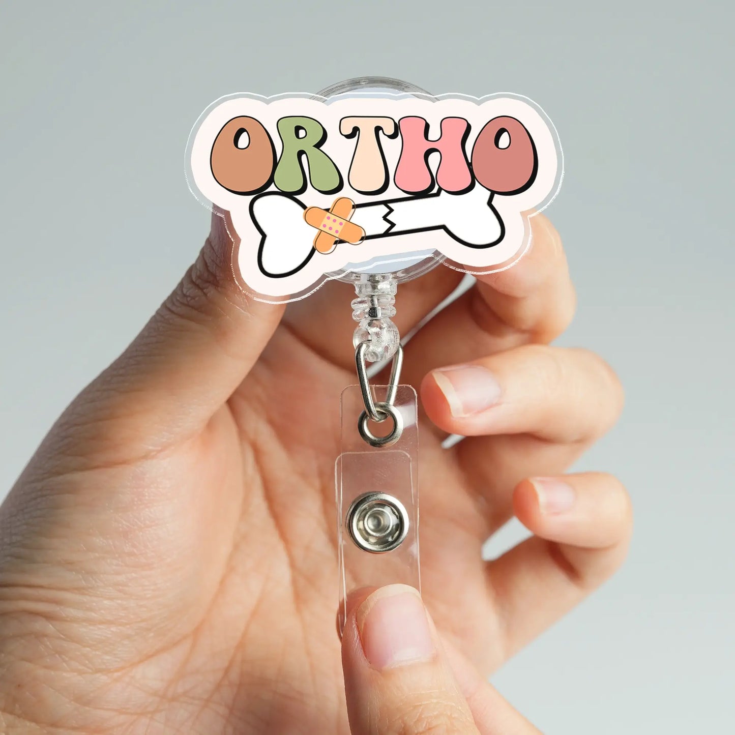 Ortho Bone Badge Reel