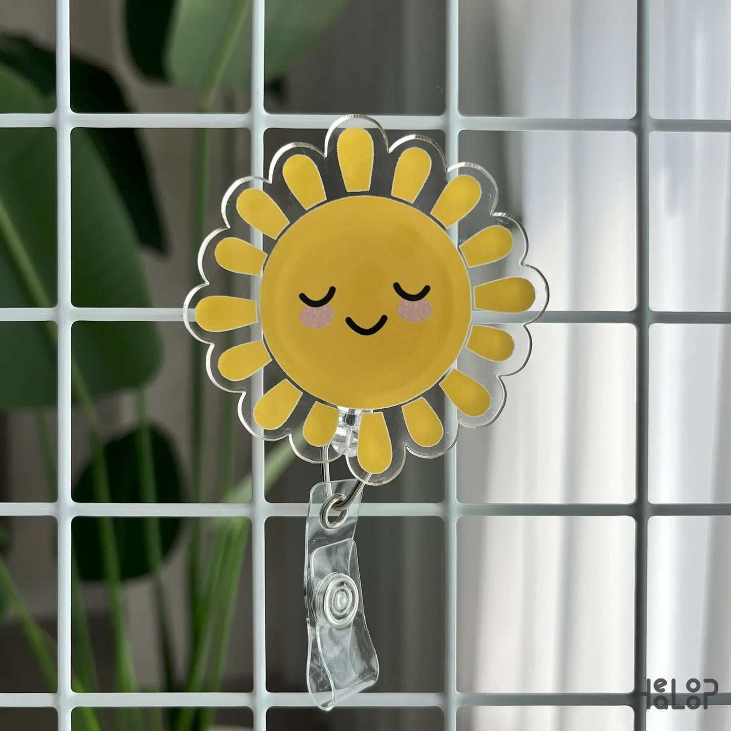 Hanging sunshine badge reel for nurse, teacher, or office staff with cheerful design.