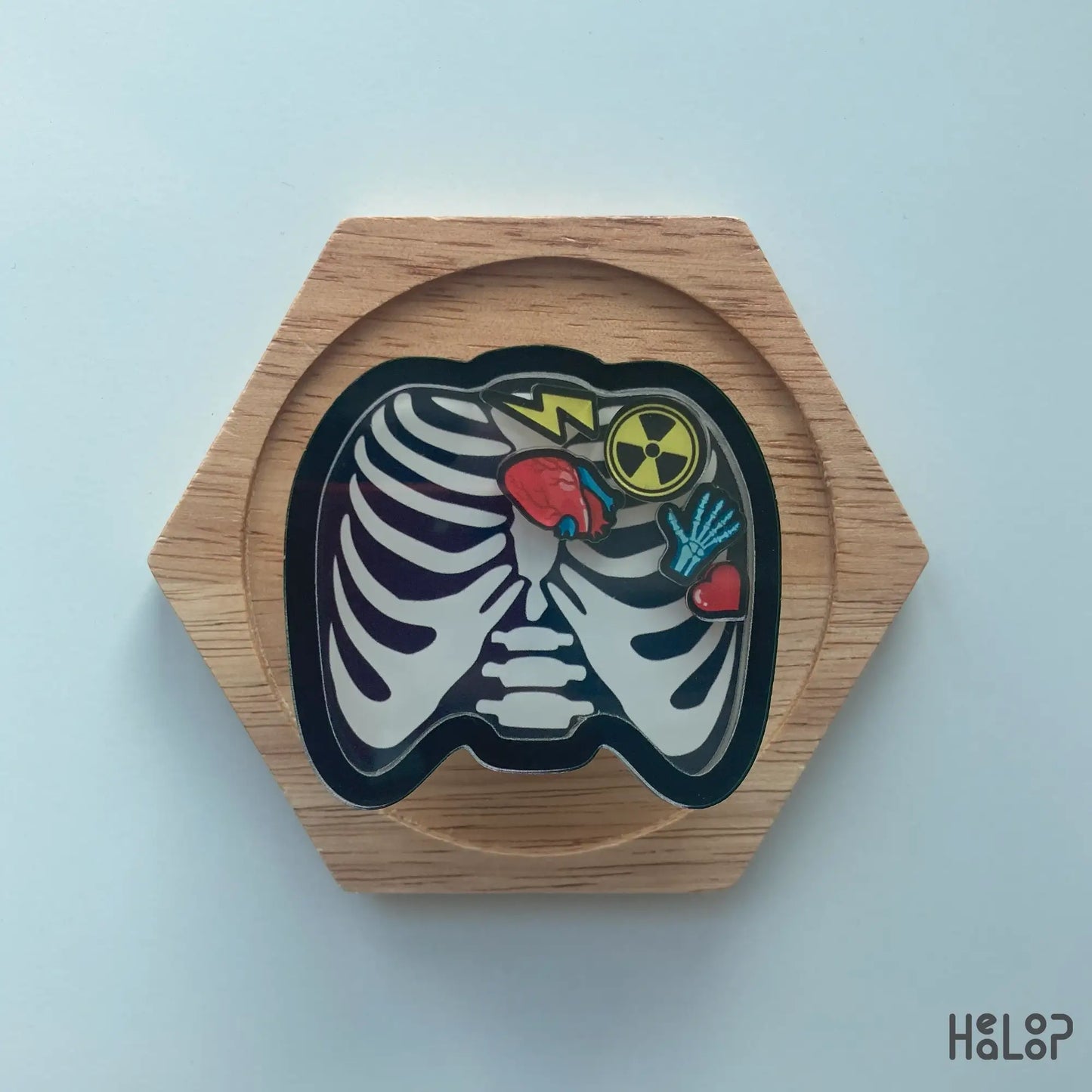 Xray tech shaker phone grip shaped like ribcage with charms