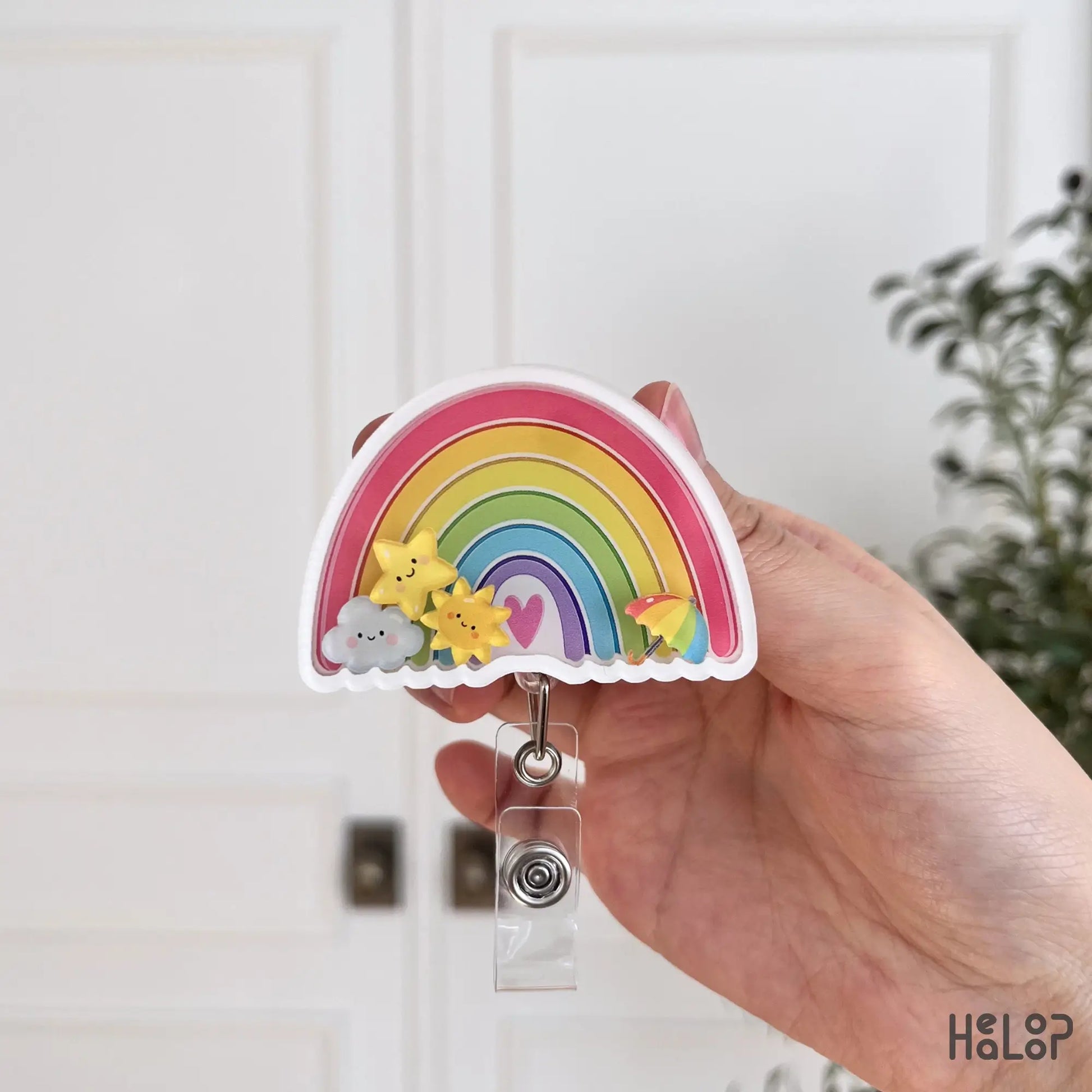 Cute rainbow nurse badge reel with colorful design, perfect retractable ID holder for healthcare workers