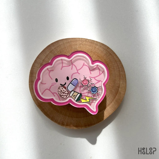 Anatomical brain-shaped shaker phone grip with charms on wood plate