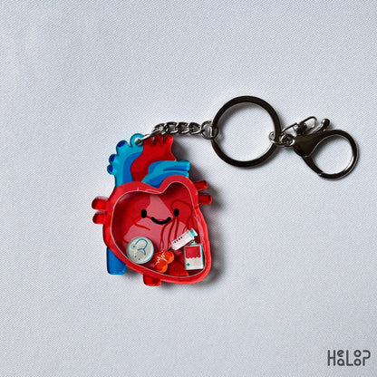 Anatomical heart shaker keychain with charms