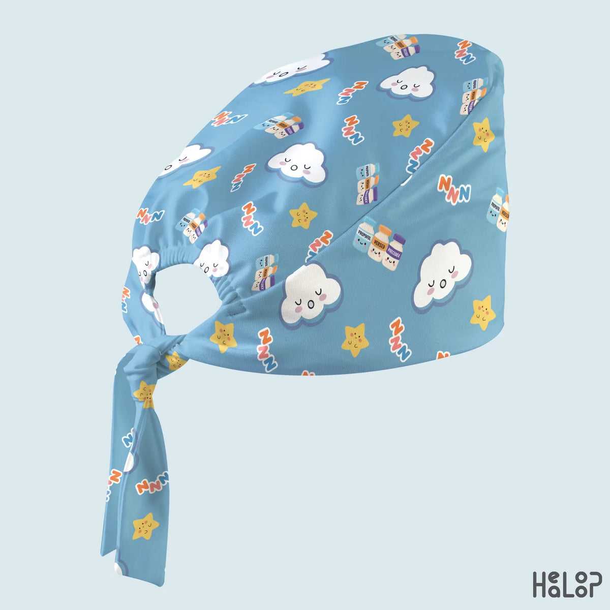 Anesthesia classic scrub cap angled side view displaying the blue cloud and star pattern, anesthesia medication illustrations, gathered elastic opening, and adjustable fabric ties.