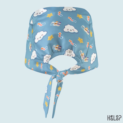 Anesthesia classic scrub cap in blue with cute sleepy clouds, stars, and anesthesia medication vials, showing the elastic back opening and adjustable tie closure.