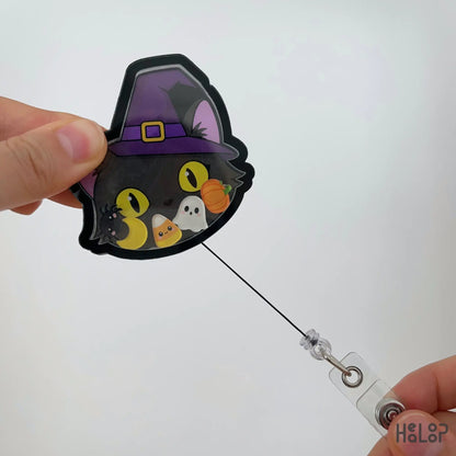Retractable Black Cat Halloween acrylic shaker badge holder with ghost, pumpkin, candy corn, moon and spider charms