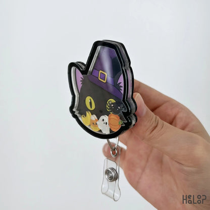 Layered acrylic Black Cat Halloween Shaker Badge Reel side profile with retractable badge clip