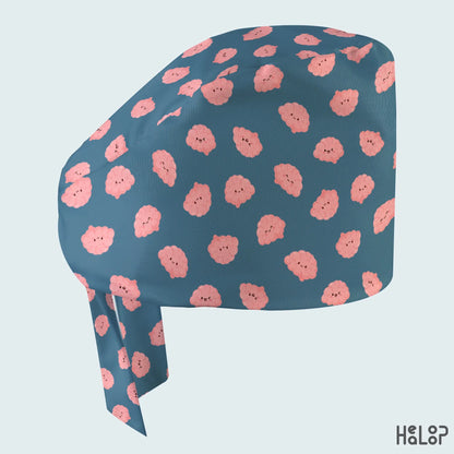Brain Classic Scrub Cap side view showing pink smiling brain illustrations on teal-blue fabric and matching ties, a cute surgical hat for nurses and doctors.