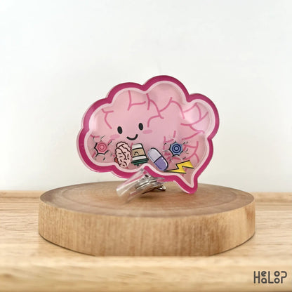 Side angle of shaker badge reel with mini brain and sparkle charms