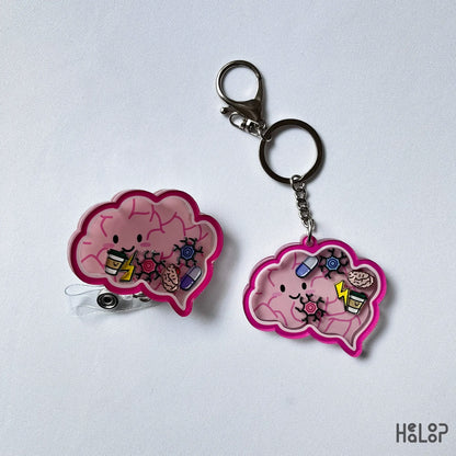 Brain-shaped shaker keychain and matching badge reel with cute medical charms.