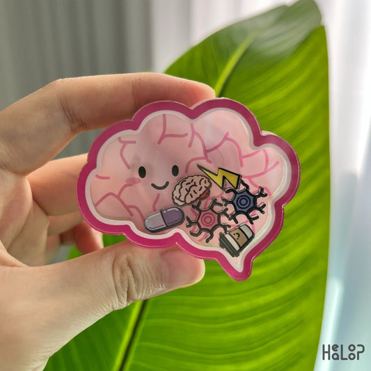 Cute anatomical brain shaker phone grip with floating charms, handheld
