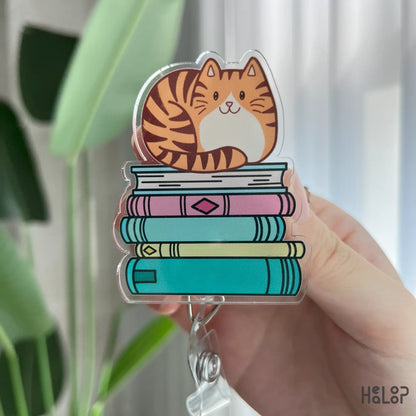 Cat sitting on stack of books retractable badge reel, acrylic bookish ID badge reel