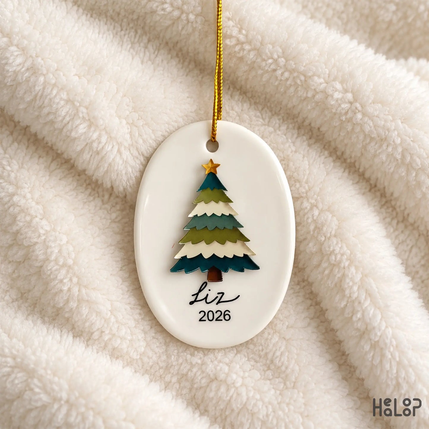 Ceramic Christmas ornament with raised layered acrylic tree personalized with the name Liz and year 2026