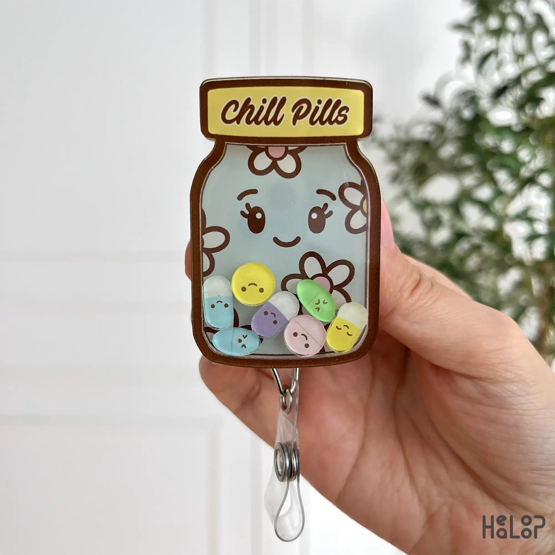 Chill Pills Shaker Badge Reel for nurses featuring pastel pill charms