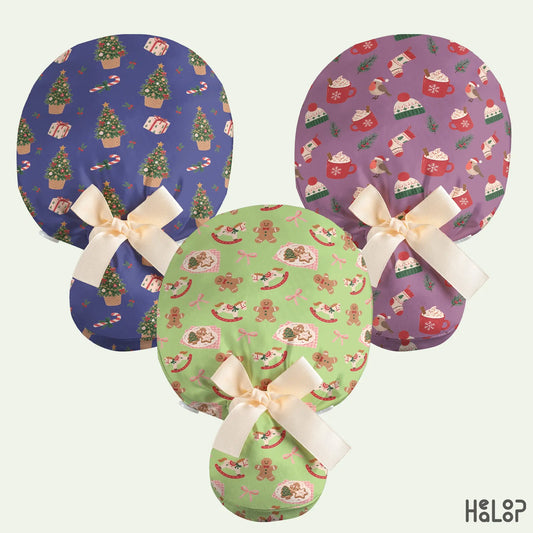 Christmas ponytail scrub cap collection featuring three holiday patterns: blue Christmas trees, purple winter cocoa, and green gingerbread, each with cream ribbon ties.