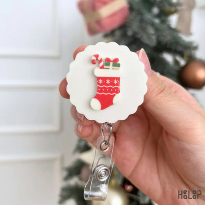Christmas stocking retractable badge reel with candy cane and present design