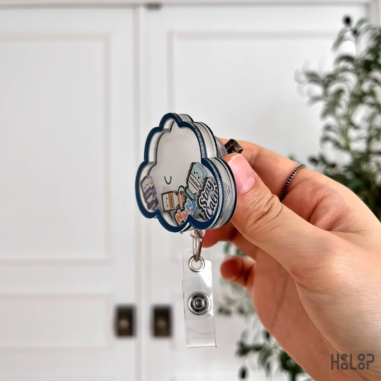 Side angle showing thickness of cloud anesthesia shaker badge reel