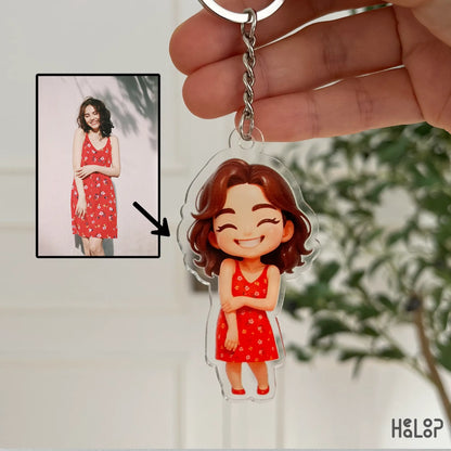 Cute acrylic chibi keychain of girl in red dress, personalized cartoon style keyring