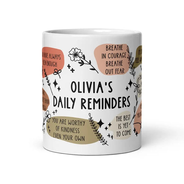 11oz mug with the customizable name 'Daily Reminders' and warm, motivational messages printed on the front.