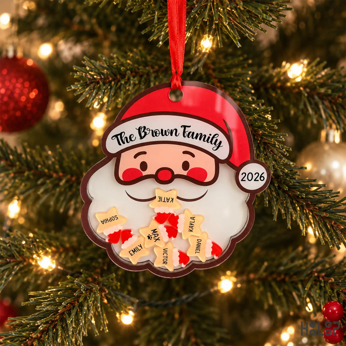 Personalized family Christmas shaker ornament with Santa and custom name charms on Christmas tree
