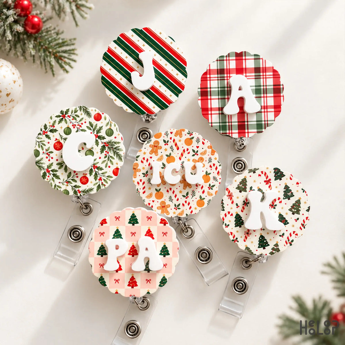 Custom Initial Christmas Badge Reels with personalized letters, plaid, Christmas trees, candy canes and holiday patterns