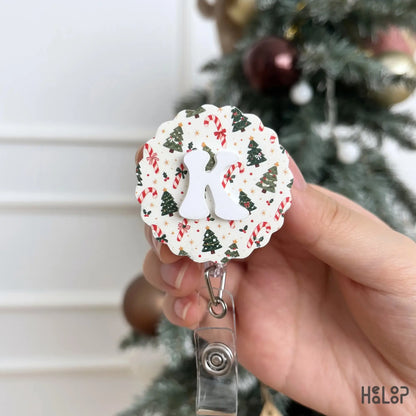 Custom Letter Christmas Badge Reel with white K, Christmas tree and candy cane pattern