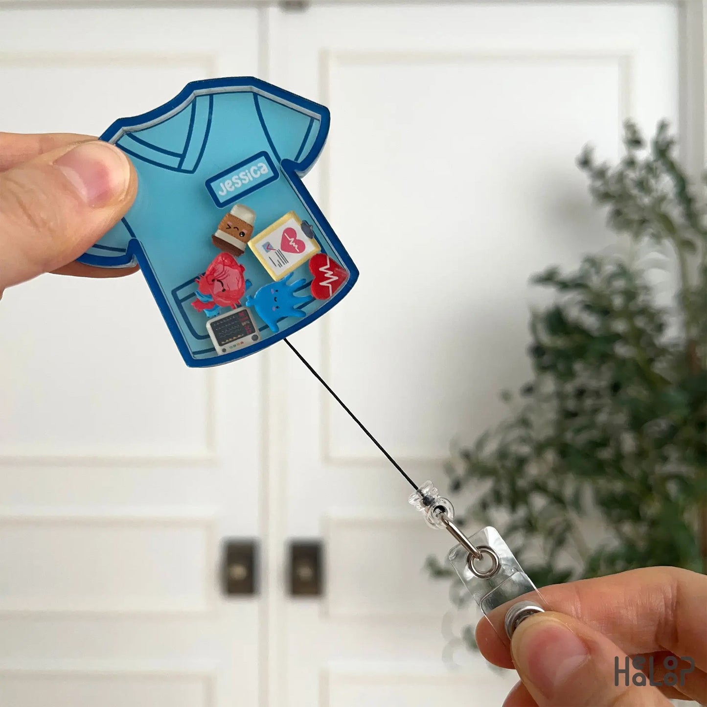 Custom nurse scrub top shaker badge reel with personalized name and selectable charms