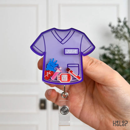 Purple scrub top nurse badge reel with name customization and medical themed charms