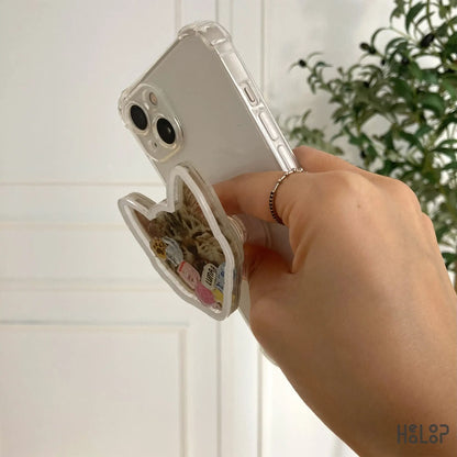 Personalized pet photo phone grip shown attached to phone case side view