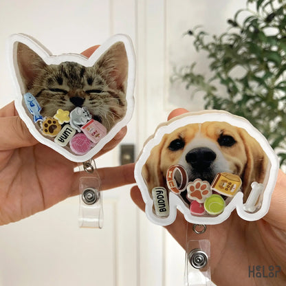 Custom pet shaker badge reels.