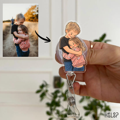 personalized family portrait badge reel featuring a hand drawn illustration of two siblings hugging, created from a customer photo.