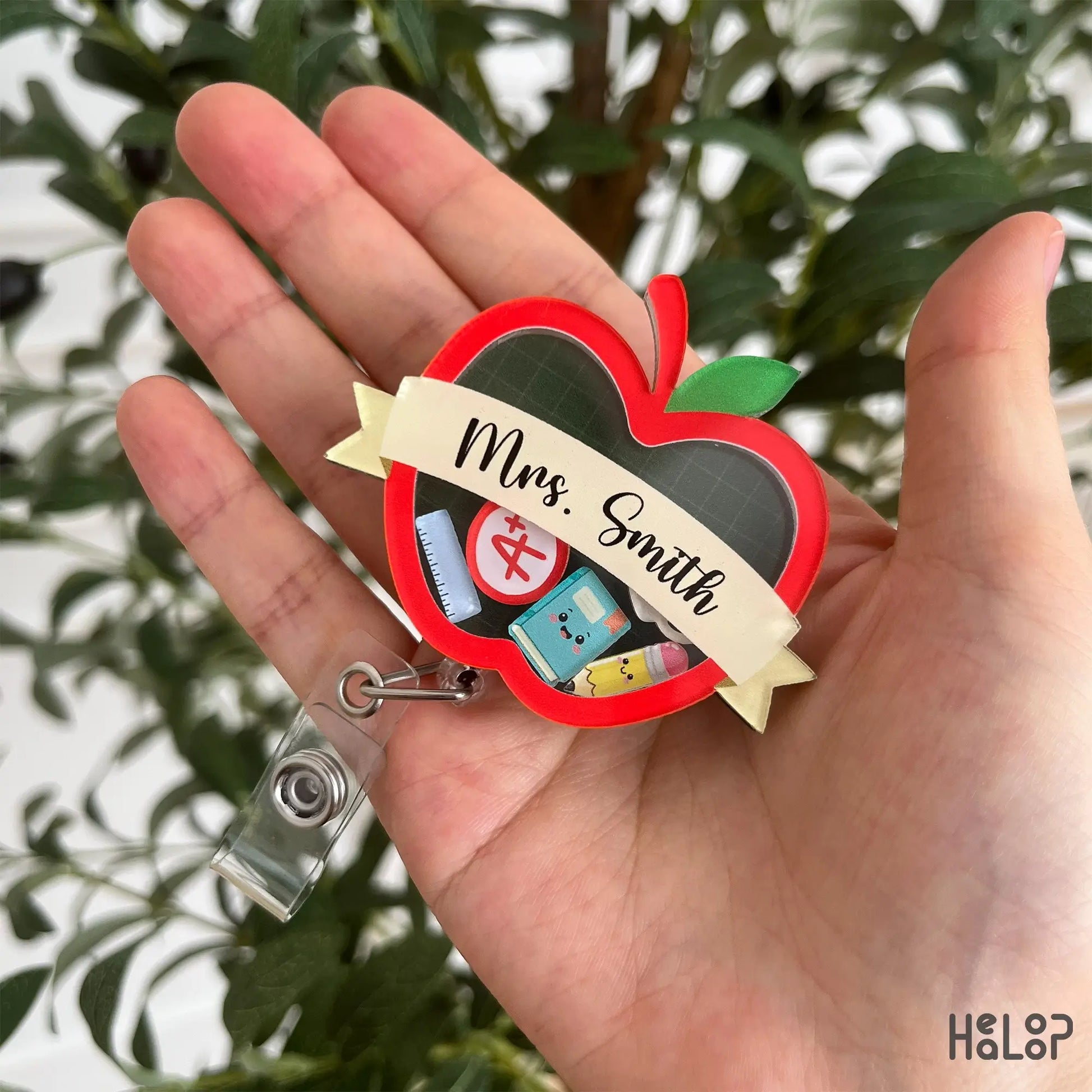 Personalized teacher apple shaker badge reel featuring custom name and classroom charms