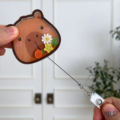 Cute Capybara retractable badge holder with an extended pull cord for nurses, teachers, veterinary professionals, and healthcare workers.