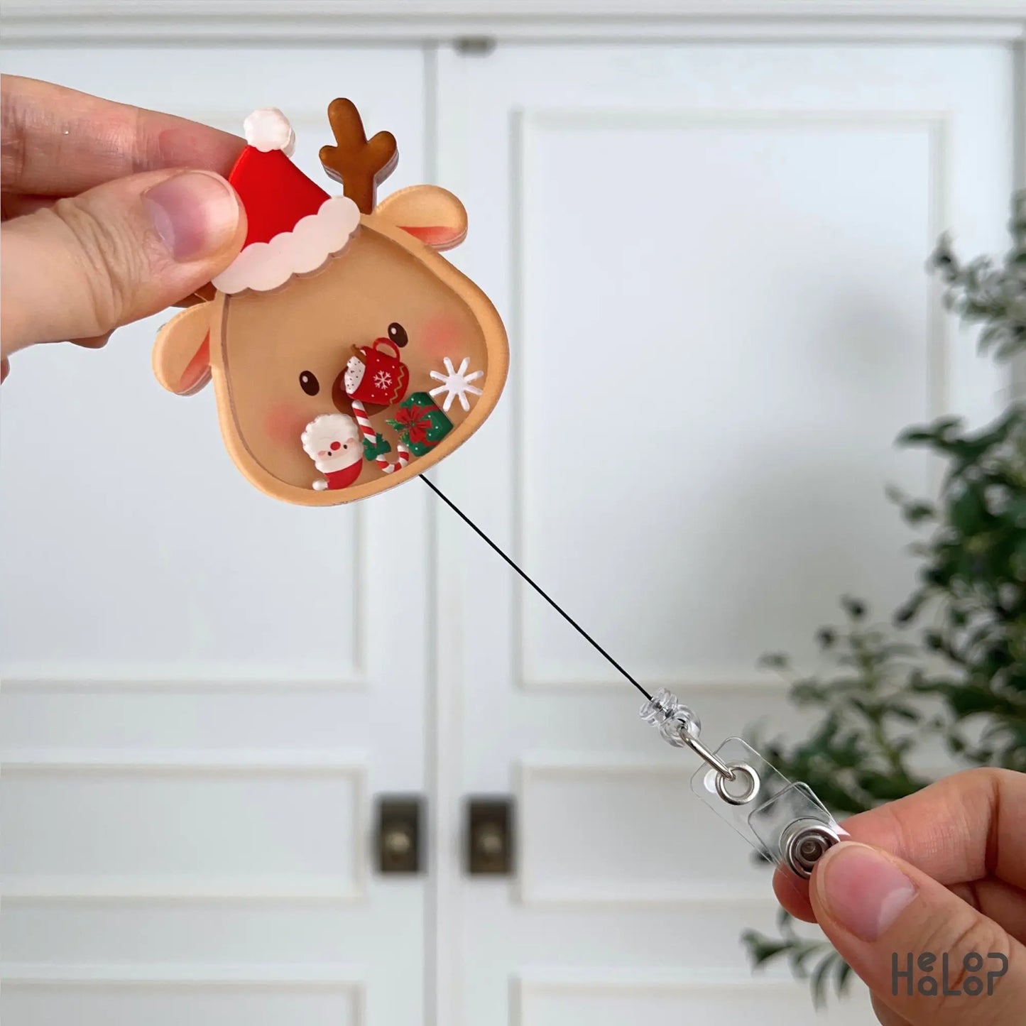 Retractable Christmas Reindeer Shaker Badge Reel with interactive holiday shaker charms, perfect for Christmas nurse accessories.