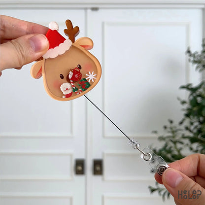 Retractable Christmas Reindeer Shaker Badge Reel with interactive holiday shaker charms, perfect for Christmas nurse accessories.