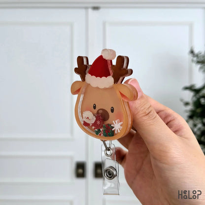 Side profile of a layered acrylic Christmas Reindeer Shaker Badge Reel showing premium construction and festive holiday details.