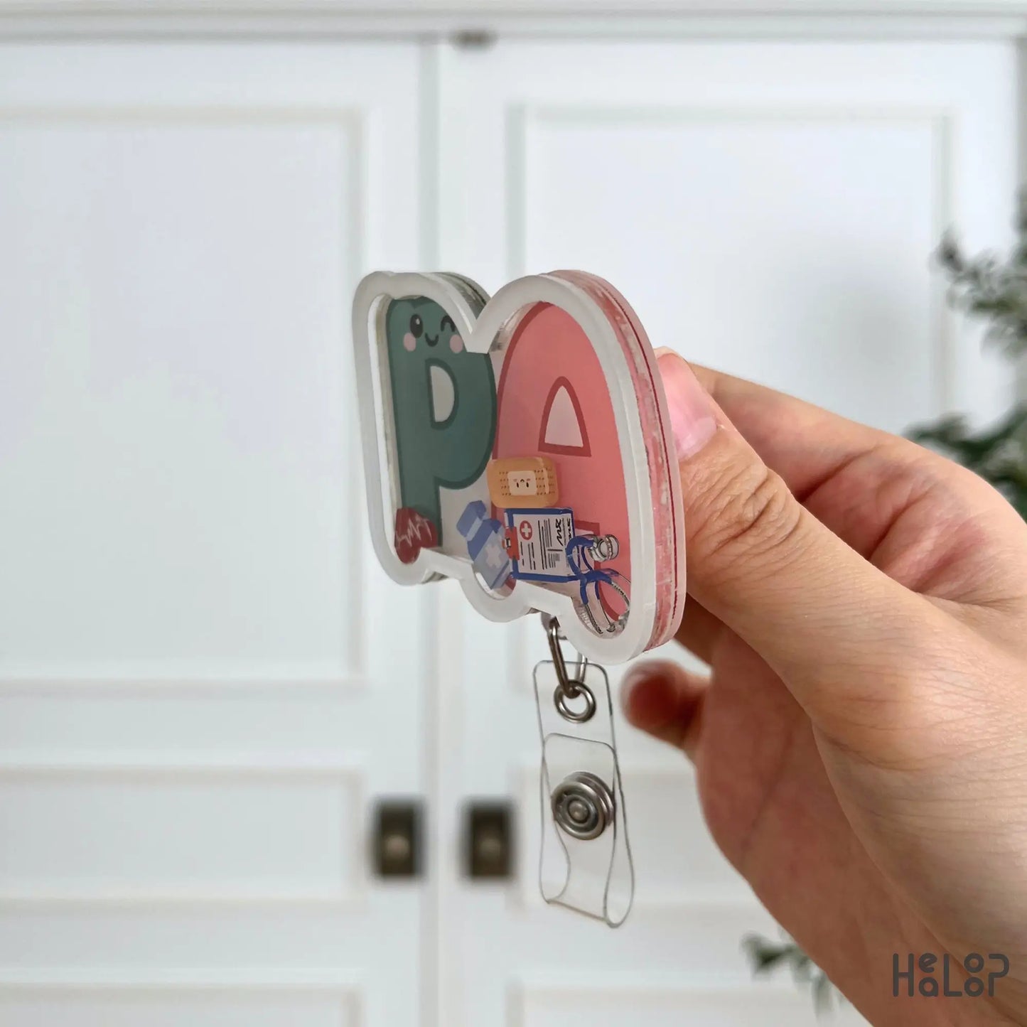 Side profile of the Cute PA Shaker Badge Reel showcasing premium layered acrylic construction and shaker design.
