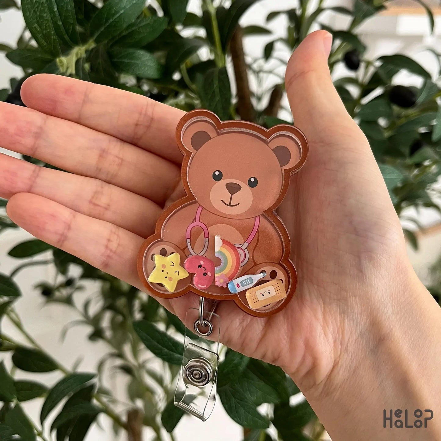 Cute Teddy Bear Shaker Badge Reel with colorful medical shaker charms, designed for pediatric nurses, nursing students, and healthcare professionals.