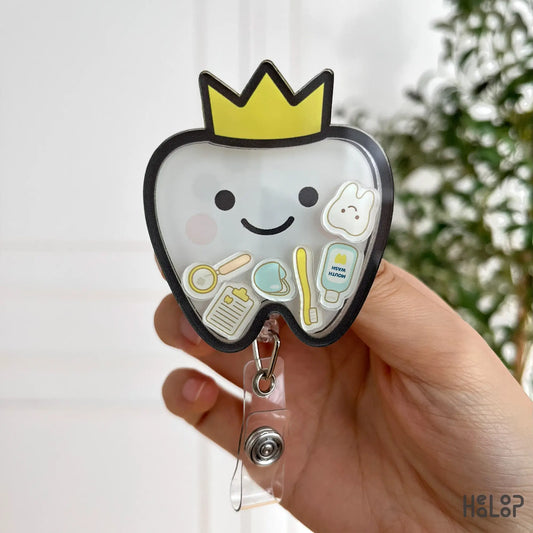 Dental Shaker Badge Reel – cute tooth design with yellow crown and mini dental tools inside