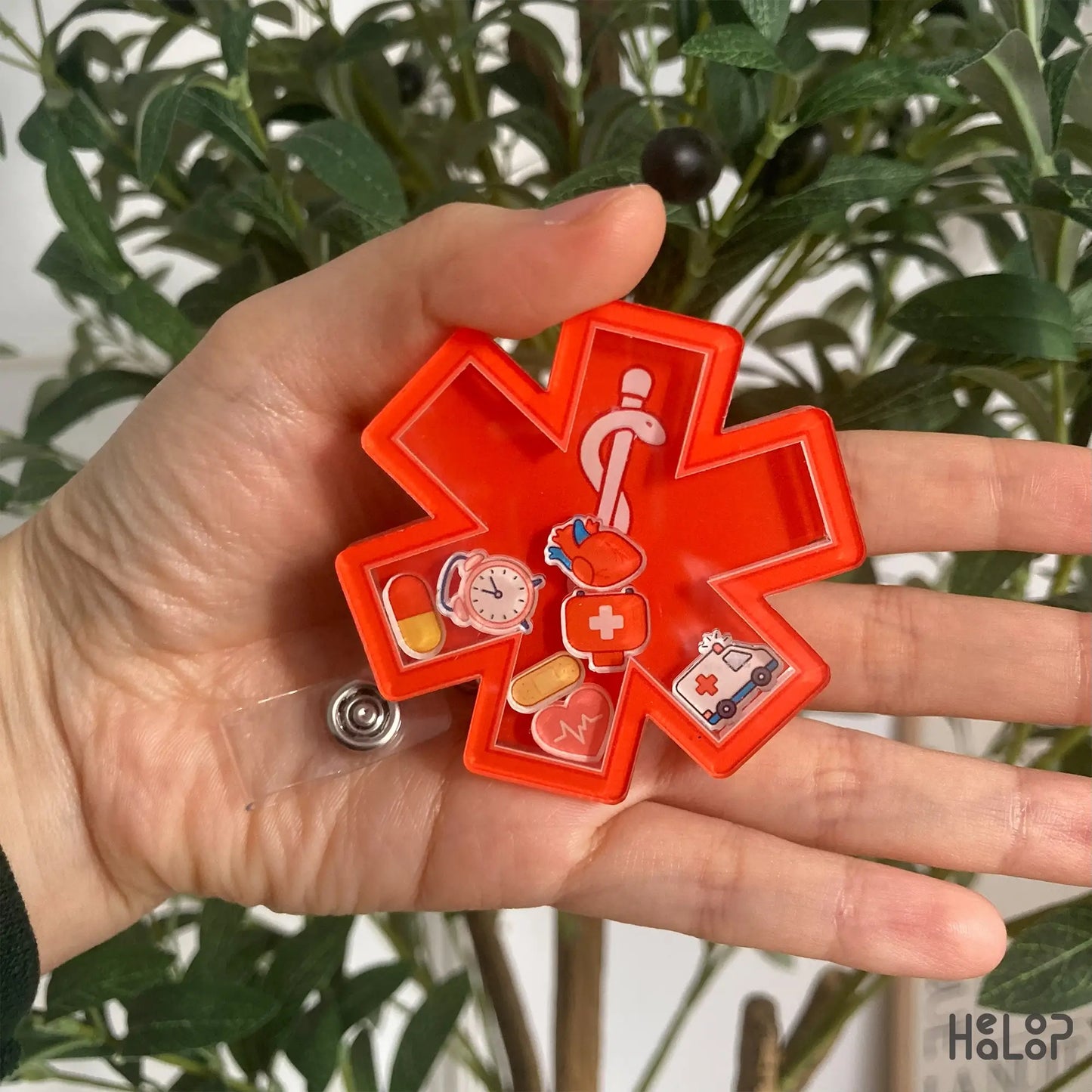 EMS Shaker Badge Reel – cute red medical star of life design held in hand