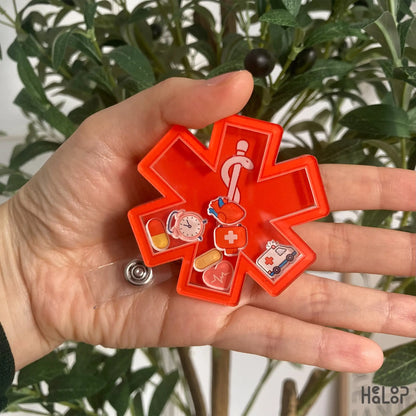 EMS Shaker Badge Reel – cute red medical star of life design held in hand