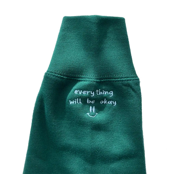 Everything will be okay sweatshirt left sleeve