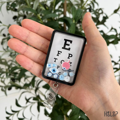 Eye Chart Shaker Badge Reel with moving ophthalmology charms for optometrists and eye care professionals.