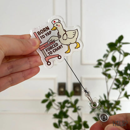 Funny nurse badge reel with cute goose cartoon and quote “Born to Yap, Forced to Chart” – retractable ID clip