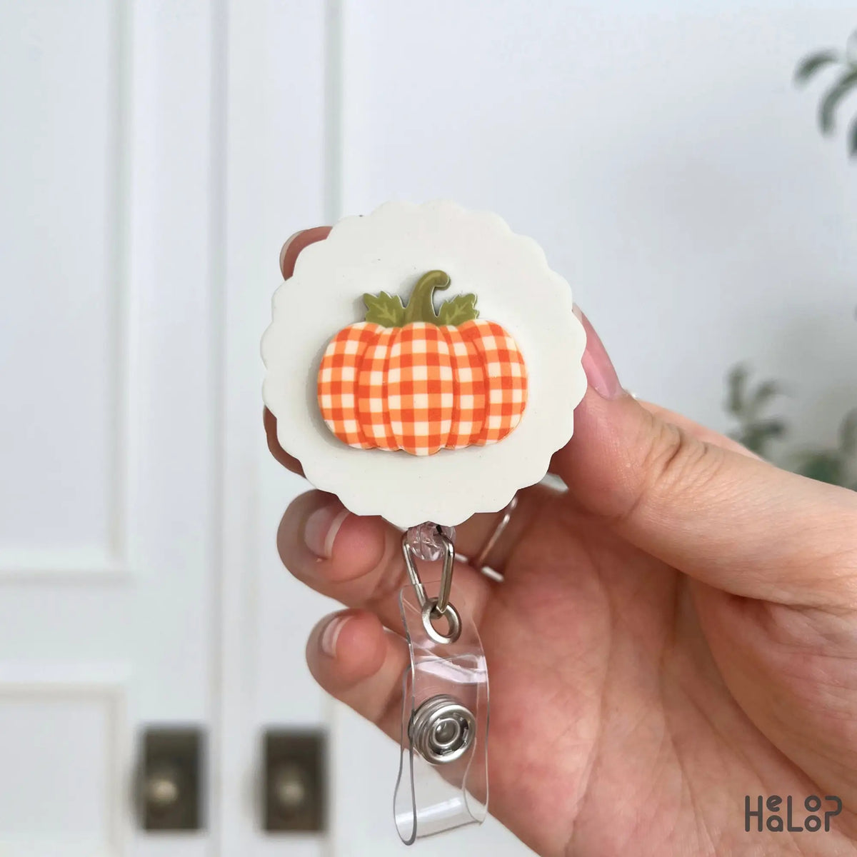 Orange and cream gingham pumpkin badge reel with 2-layer acrylic fall design